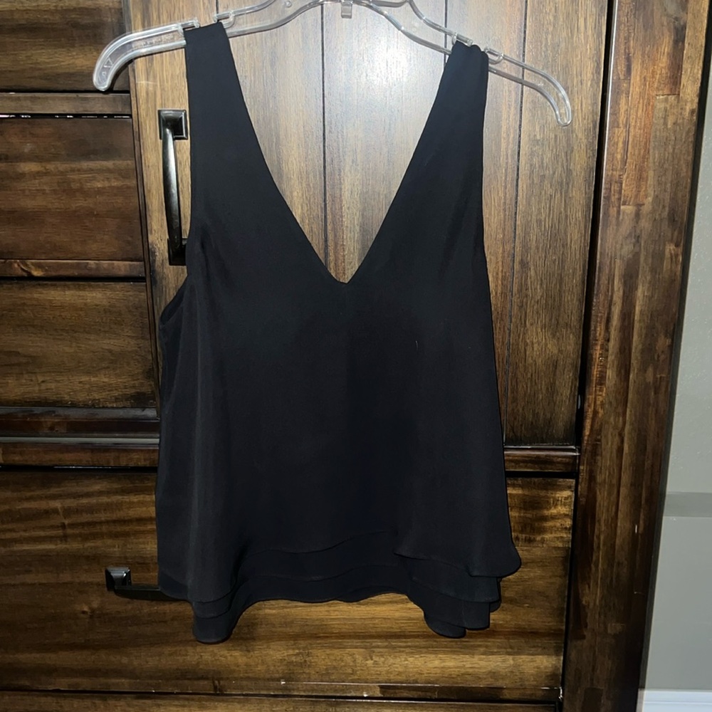 Black sleeveless blouse